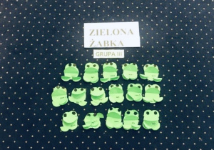 Praca plastyczna - zielona żabka wykonana techniką origami płaskie z koła.
