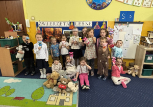 Dzieci pozują do zdjęcia wraz ze swoimi misiami.