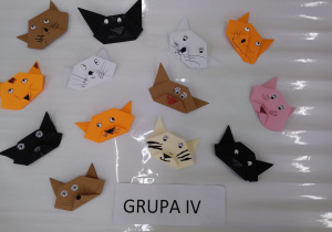 Prace dzieci wykonane techniką origami - koty.